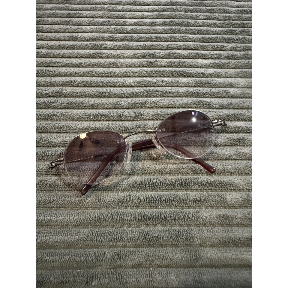 Gafas de sol Givenchy VGV048 con marco de metal ovalado Italia gafas de diseñador Foto 2 de 4