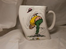 TWISTED SQUARE NOVELTY PORCELAIN GOLF MUG 1991 "THE RESULTS OF OVER-SWING"