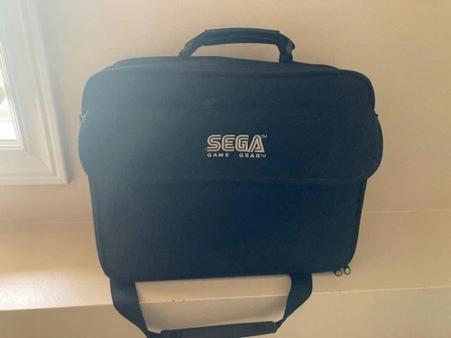 SEGA GENESIS NOMAD MK-6100 WITH BAG, BATTERY PACK, AC + CAR + RF ADAPTER TESTED