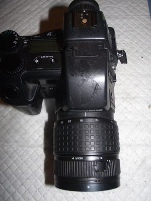 OLYMPUS CAMEDIA E-10, 4.0 MP DIGITAL SLR CAMERA, WITH A 9-36MM F2.0-2.4 LENS