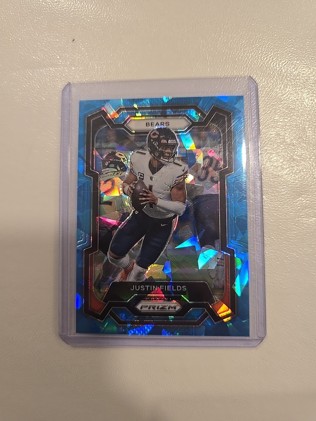2023 Prizm #48 Justin Fields #97/99 Cracked Blue Ice Chicago Bears Card. Jets QB