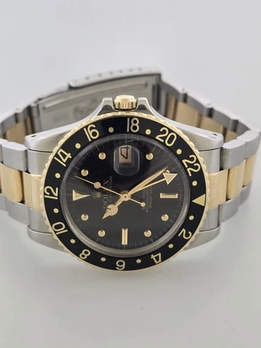 Rolex GMT Master 16753 18K/SS 40MM 6.1 Million Nipple Sport Watch. Boxes/Books