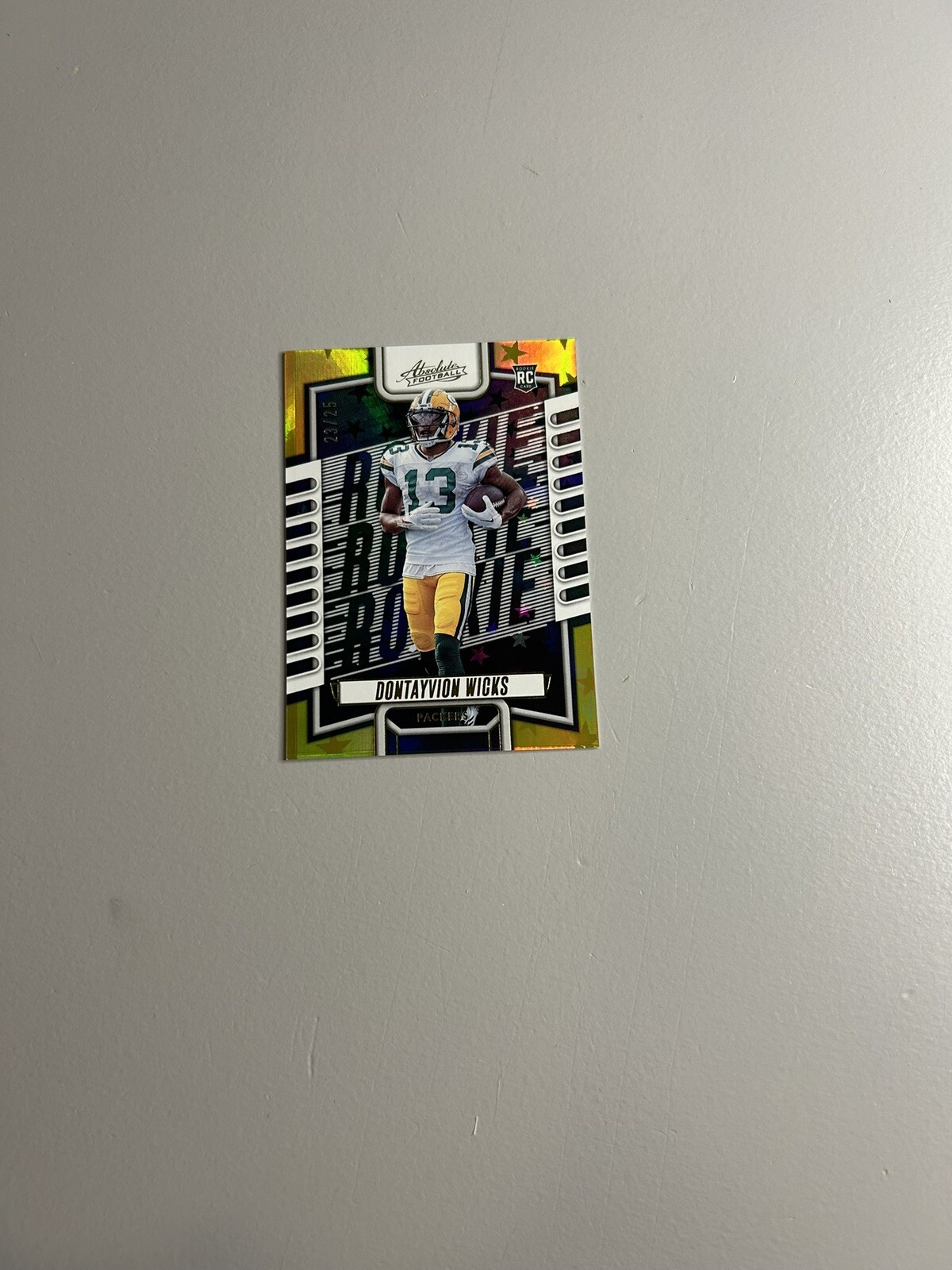 2023 Panini Absolute Dontayvion Wicks Rc #199 Rookie Gold Stars 23/25 With Mag