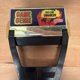 Nintendo NES Game Genie with Original Booklet Missing Back Cover