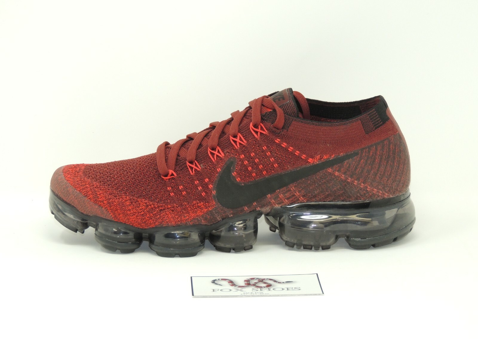 black vapormax with red