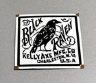 VINTAGE 12” BLACK RAVEN KELLY AXE PORCELAIN SIGN CAR TRUCK OIL GAS MOTORCYCLE
