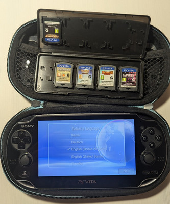 Bundle Sony Playstation PS Vita  (PCH-1003) mit 5 Spielen und Hülle Zubehörpaket