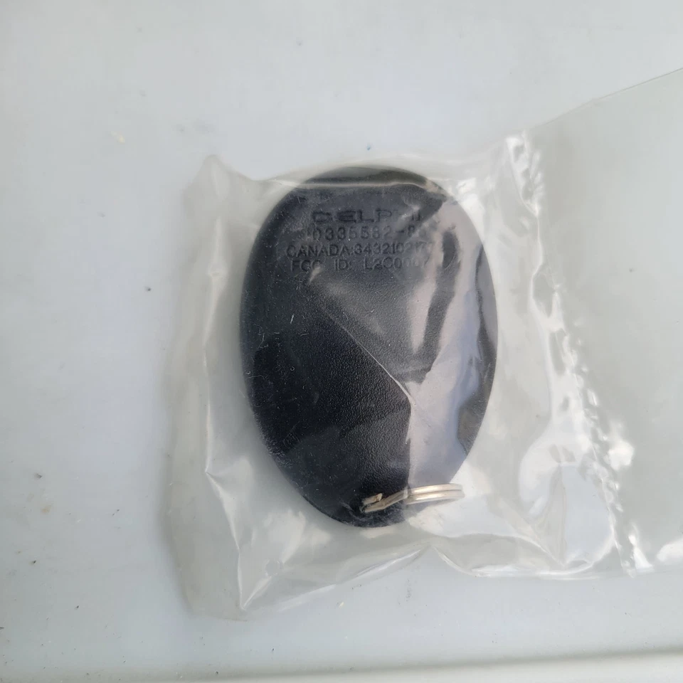 GM Delphi L2c0007T 10335587 Entrada sin llave Alarma remota Llave de 3 botones Foto 3 de 4