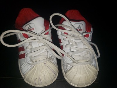 red and white shell toe adidas