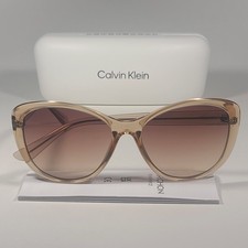 Calvin Klein Cat Eye Sunglasses CK19560S 270 Tan Crystal Brown Gradient Lens