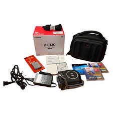 Canon DC320 DVD Camcorder Bundle w/ Charge, Extra Battery, Case, Discs, Straps