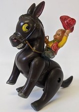 Vintage 1940's Masudaya, Japan CELLULOID Wind-up BUCKING DONKEY w/ Rider