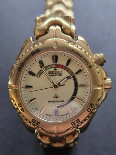 Vintage Seiko Kinetic 3M22-0B99 Sport 100 Women Gold Watch Water Resistant