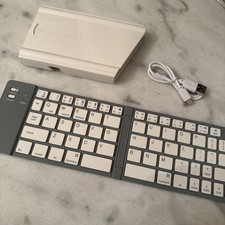Portable Folding bluetooth Mini Keyboard, Cord Included. Brand New. In Box.