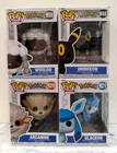 NEW Lot of (4) Funko POP POKEMON (DAMAGED BOXES) Umbreon Glaceon Arcanine Wooloo