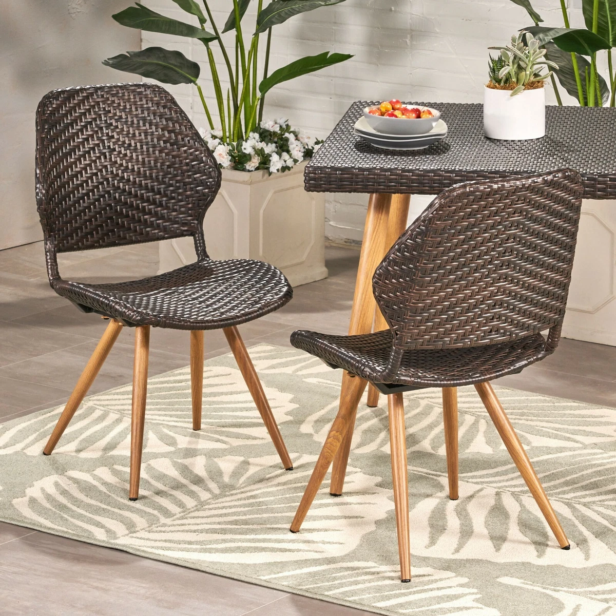 Amaya Outdoor Multi brown Wicker Dining Chairs with Brown Wood Finish Metal Legs