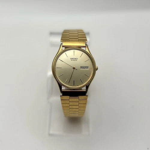 Vintage Seiko Quartz Gold Tone Day/Date Men's Wristwatch 34mm 1986 New Battery