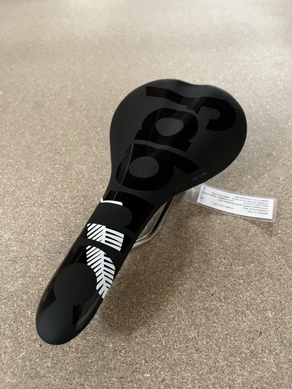 Fabric Saddle new Zealand logo
