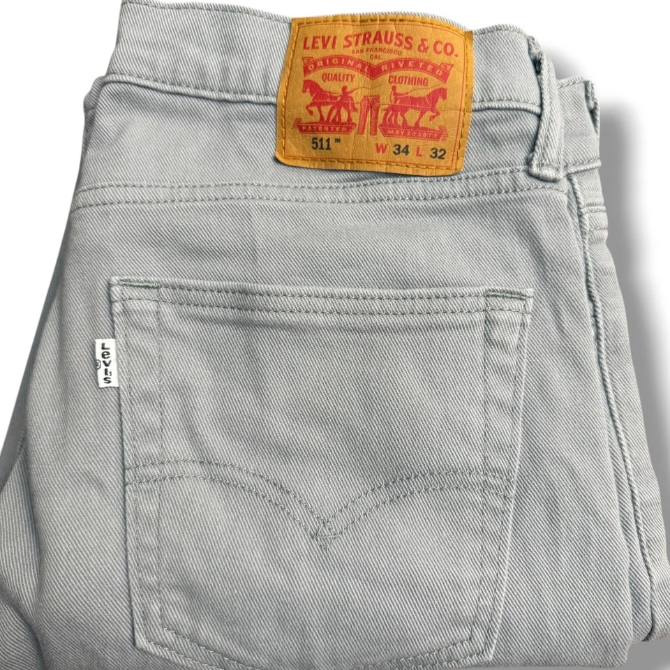 Pantalones de mezclilla ajustados gris claro Levi Strauss & Co 511 para hombre W34 L32 lengüeta blanca Foto 2 de 4