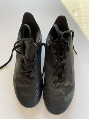 predator cleats black