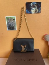 Pochette Louis Vuitton - modèle Louise - grand modèle - cuir noir