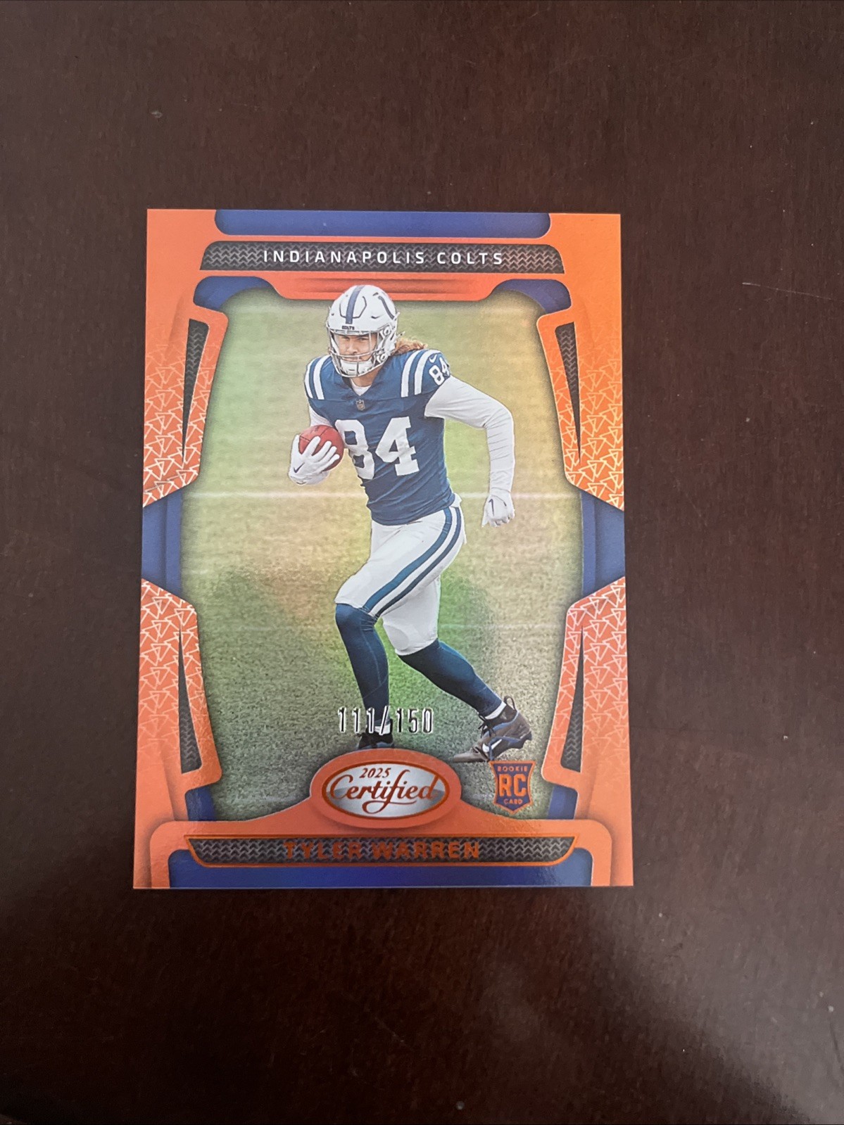 2025 Panini Certified - Rookies Tyler Warren #113 Mirror Orange /150 (RC)