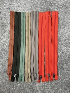 9 qty - 11 1/2” multi color zippers