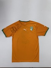 PUMA Herren Orange Côte dIvoire Fußball Tri...