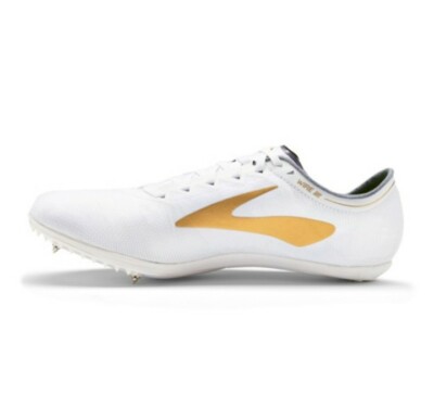 white and gold nike spikes
