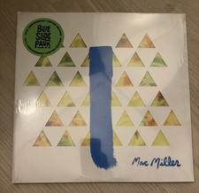 Image of Blue Slide Park 10th Anniv Deluxe Clear Blue/Yellow Splatter Vinyl - Mac Miller
