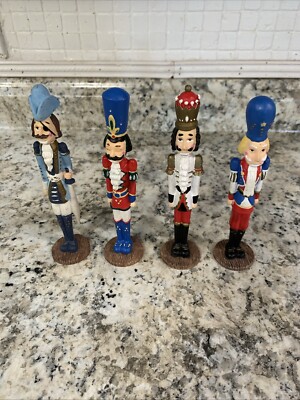 Set of 4 Assorted Porcelain? Maybe Poly resin Nutcracker Figurines