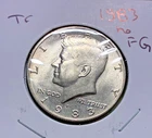 1983-P Kennedy Half, almost no FG Theo Challenge coin. Free S/H