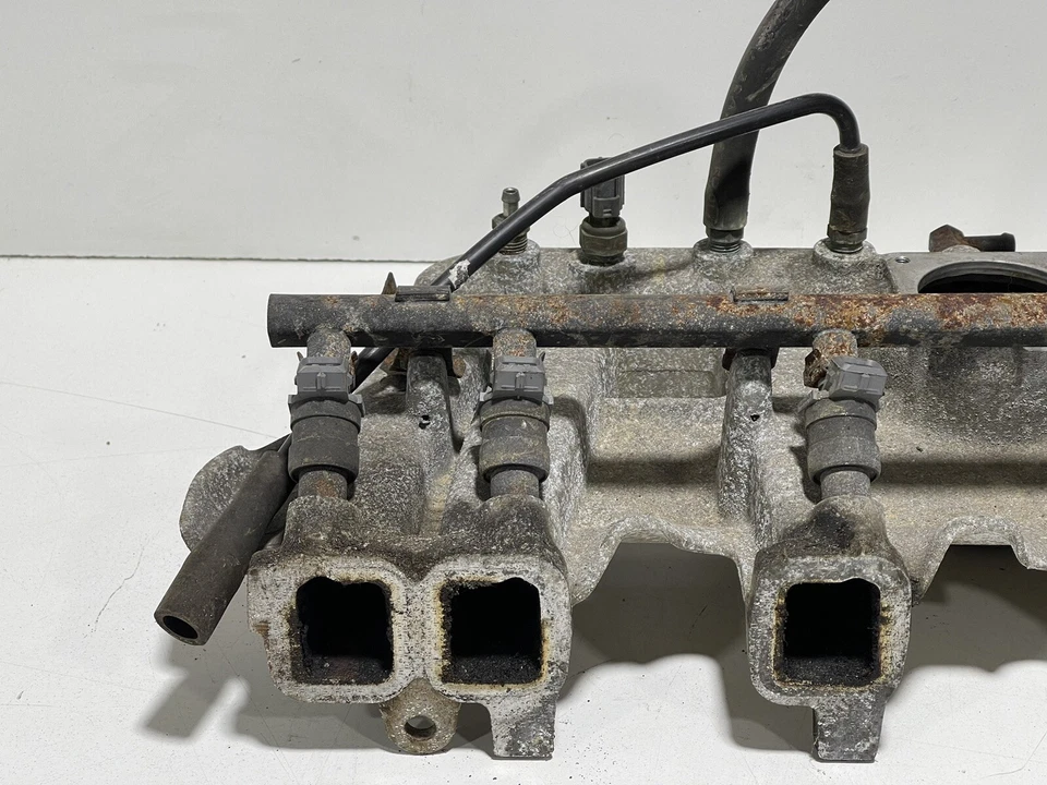 Jeep Wrangler TJ 1997-1998 4,0 colector de admisión OEM 6 cilindros inyector de riel de combustible Foto 3 de 4