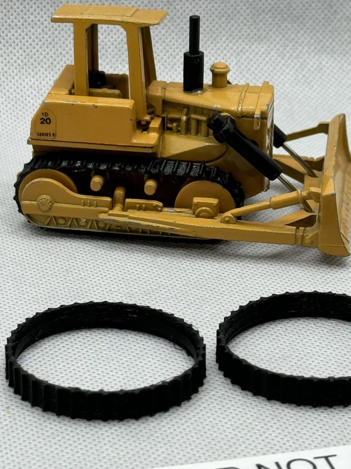 1 par de pistas nuevas para bulldozer 1/64 ERTL DIECAST INTERNATIONAL TD20 Foto 2 de 4