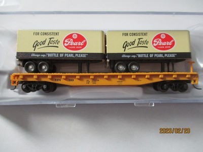 Atlas Trainman # 50006511 TXTC Flatcar w/ 24' Pearl  Beer Trailers N-Scale