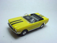 MODEL MOTORNG YELLOW MUSTANG CONVERTIBLE HO SLOT CAR BODY W/BLACK STRIPES. NEW.