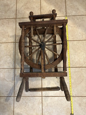 VINTAGE WOODEN SPINNING WHEEL .