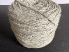 Cone of yarn , light gray color 6-7oz., combination of acrylic/ natural blend
