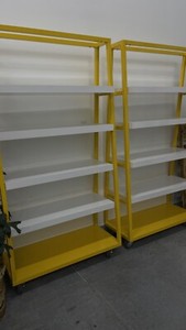 2 Yellow/White modular commercial grade retail shelves on Wheels