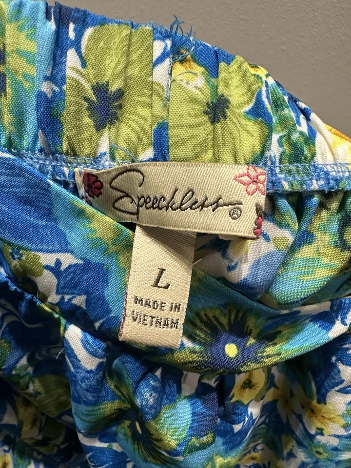 Pantalones cortos florales azules y amarillos Speechless niños talla L Foto 3 de 3