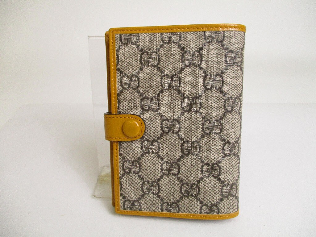 Authentic GUCCI GG Supreme Orchre Leather Passport Holders