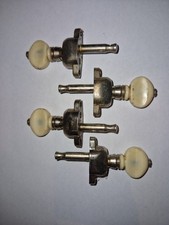 set of 4 vintage geared banjo tuners