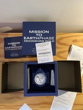 Swatch x Omega Snoopy Mission To Earthphase Moonshine Gold - SO33N704L 