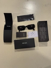 PRADA PR17WS sunglasses, black frame and dark lenses. Fast, free shipping.