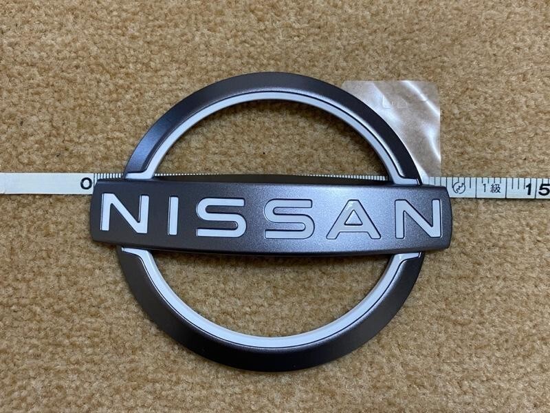 Nissan OEM 370Z Front Bumper New Logo Emblem 62890-6GP0A