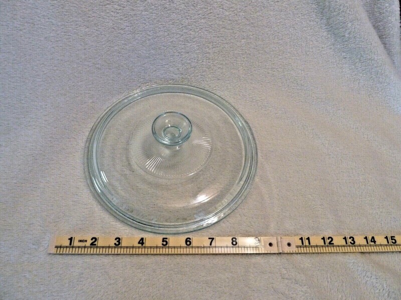 Pyrex 9" round glass lid with handle. Vintage.  No chips.
