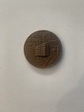 Medaglia Cinquantenario case popolari Milano LEGGERE