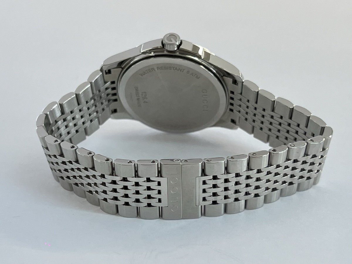 Gucci G-Timeless Brown “G” Dial Steel 38mm Quartz Watch Gucci G-Timeless Brown “G” Dial Steel 38mm Quartz Watch