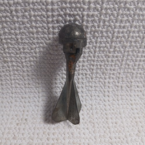 Vintage metal cap bomb toy, also known as a cap dart or cap grenade. | eBay