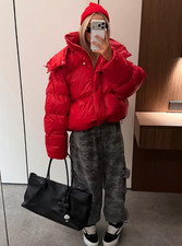 Women  s padded winter jacket in a vibrant red, featuring an oversized collar
